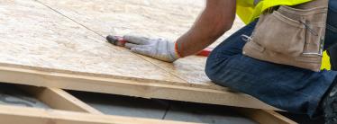 A builder in PPE at work