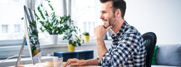 man at computer in office